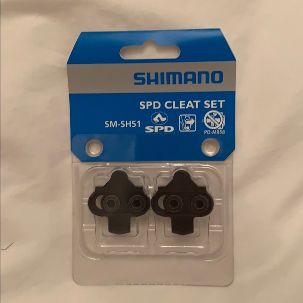 Bike clip compatible with indoor cycling bikes